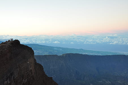 two persons standing on cliff thumbnail