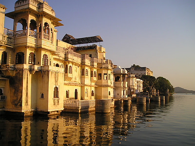 concrete buildings near body of water thumbnail