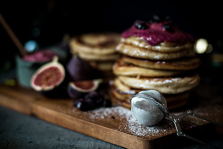 selective focus photography of gray ice cream scoop on brown wooden table thumbnail
