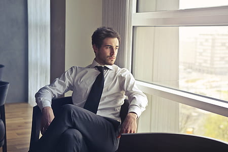Man Wearing White Dress Shirt and Black Necktie thumbnail