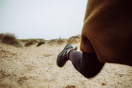 person running beside grass thumbnail