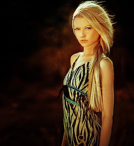 blonde haired woman in black and white spaghetti strap dress thumbnail