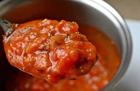 shallow focus photography of red sauce on spoon thumbnail