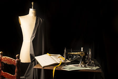 brown sewing machine beside mannequin thumbnail