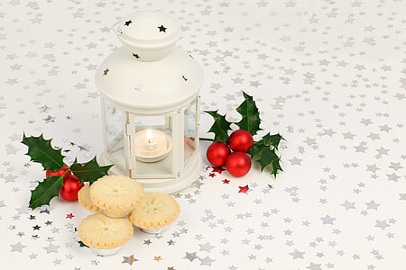 white candle lantern near the chrysanthemum and cookies thumbnail