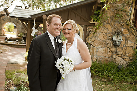 bride holding  bouquet and groom thumbnail