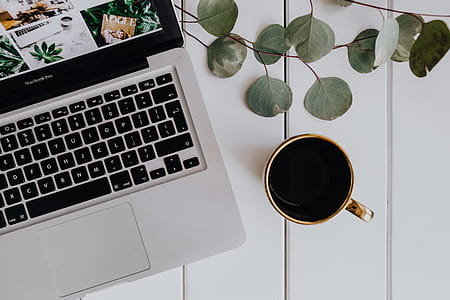 Apple MacBook & Coffee on the white desk thumbnail