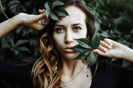 shallow focus photography of blonde haired woman thumbnail