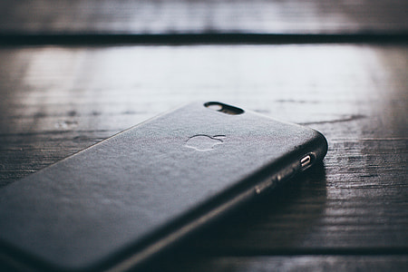 iPhone smartphone mobile on a wooden table thumbnail