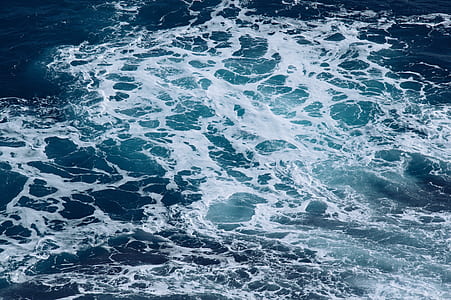photo of body of water waves during daytime thumbnail
