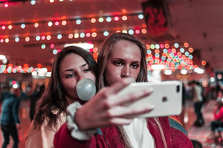 woman taking selfie using iPhone 7 thumbnail