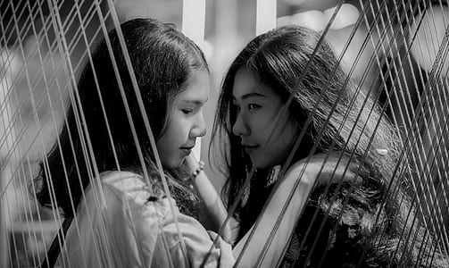 Grayscale Photography of Two Girls thumbnail