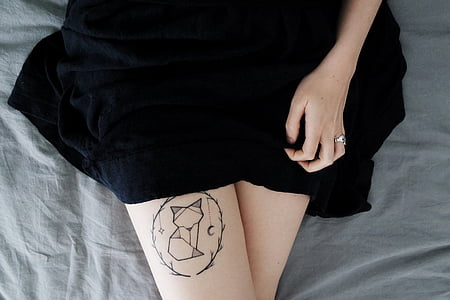 person wearing black skirt thumbnail