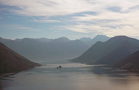 photo of mountains covered with fogs thumbnail