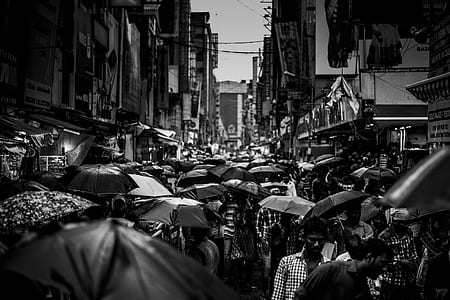 grayscale photography of people walking on street thumbnail