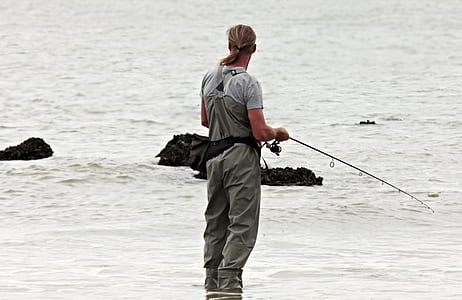 man holding fishing rod thumbnail
