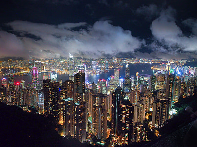 lighted high rise building at nighttime thumbnail