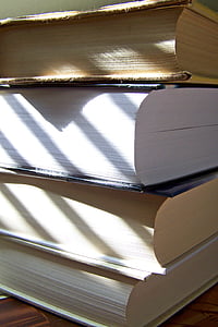 pile of four books thumbnail