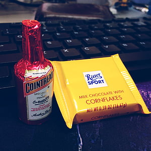 milk chocolate pack beside champagne bottle thumbnail