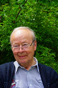 man near green leafed tree thumbnail