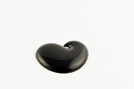 black Bluetooth earpiece against white background thumbnail