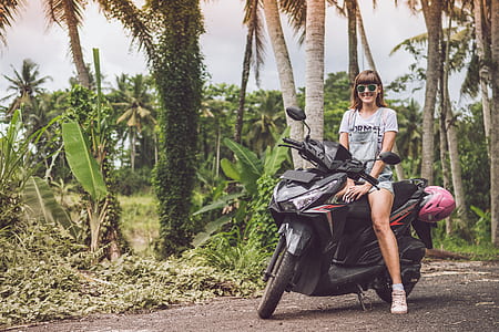 woman sitting on motorcycle thumbnail