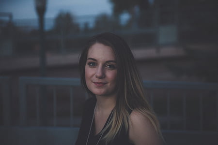 woman wearing black tank top photo thumbnail