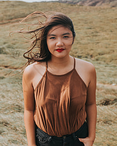 woman standing on the mountain thumbnail
