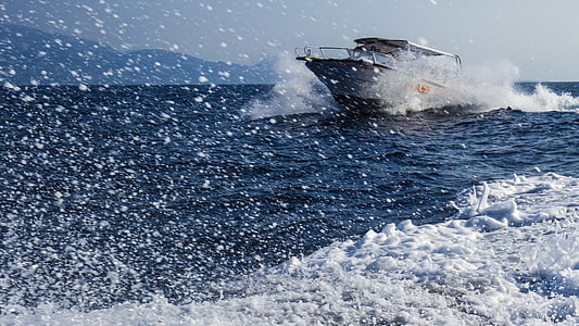gray boat on body of water thumbnail