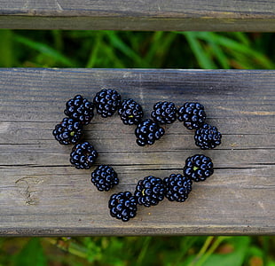 rasp berries on brown table thumbnail