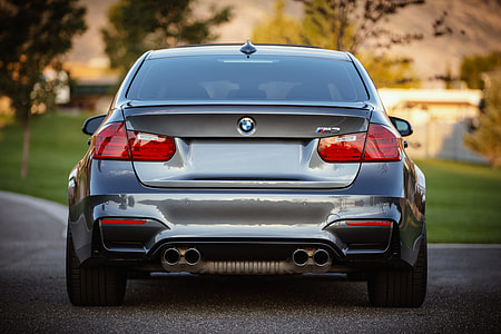 silver BMW M3 on asphalt road during day time thumbnail