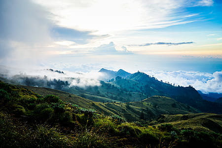mountains with fog during daytime thumbnail