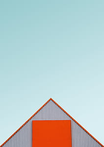 orange and gray house roof under blue sky thumbnail