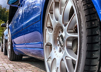 close-up photography of chrome wheel and tire thumbnail
