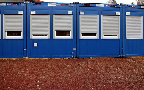 blue shed on ground thumbnail