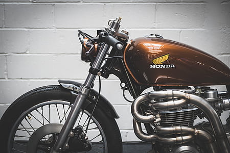 orange Honda motorcycle thumbnail