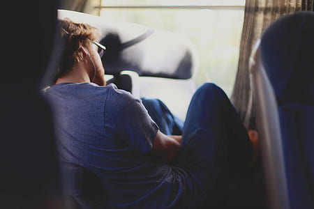man, person, train, sitting thumbnail