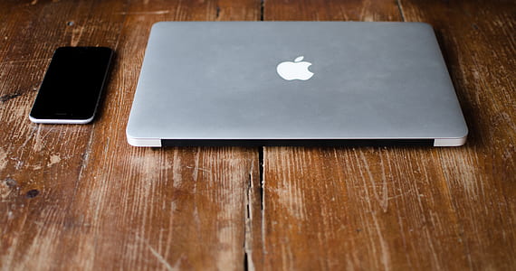 MacBook Pro beside smartphone thumbnail