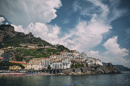 Wide angle shot taken from the pier looking back at Amalfi town on the gorgeous Amalfi Coast in Italy thumbnail