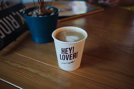 Disposable Cup With Latte and Hey! Lover! Printed Text thumbnail