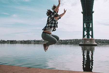 woman wearing white and black checked sport shirt thumbnail