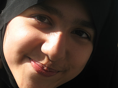 woman wearing black hijab headdress thumbnail