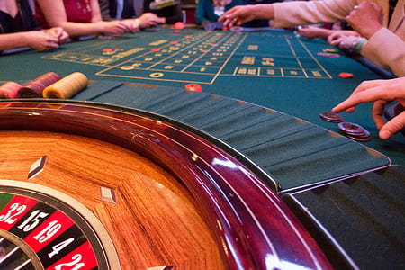 people sitting in front of casino roulette thumbnail