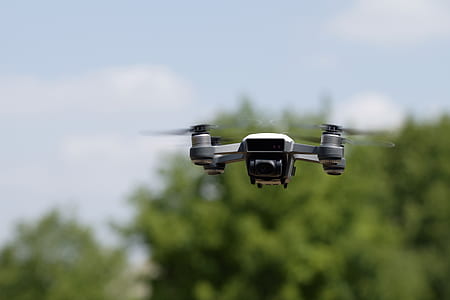 black and white quadcopter on flight thumbnail