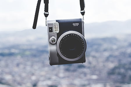 black and gray Fujifilm Instax camera thumbnail