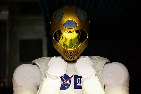 person wearing yellow full-face helmet thumbnail