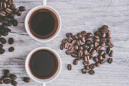 two coffee filled cups thumbnail