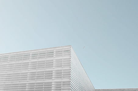low angle photo of gray building thumbnail