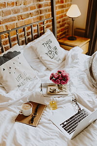 Morning coffee in bed. Working in bed thumbnail