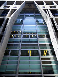 bottom view of building with glass windows thumbnail